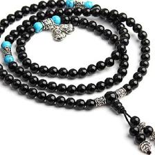 探秘藏式美学 天然黑玛瑙佛珠手链的文化意蕴与市场价值